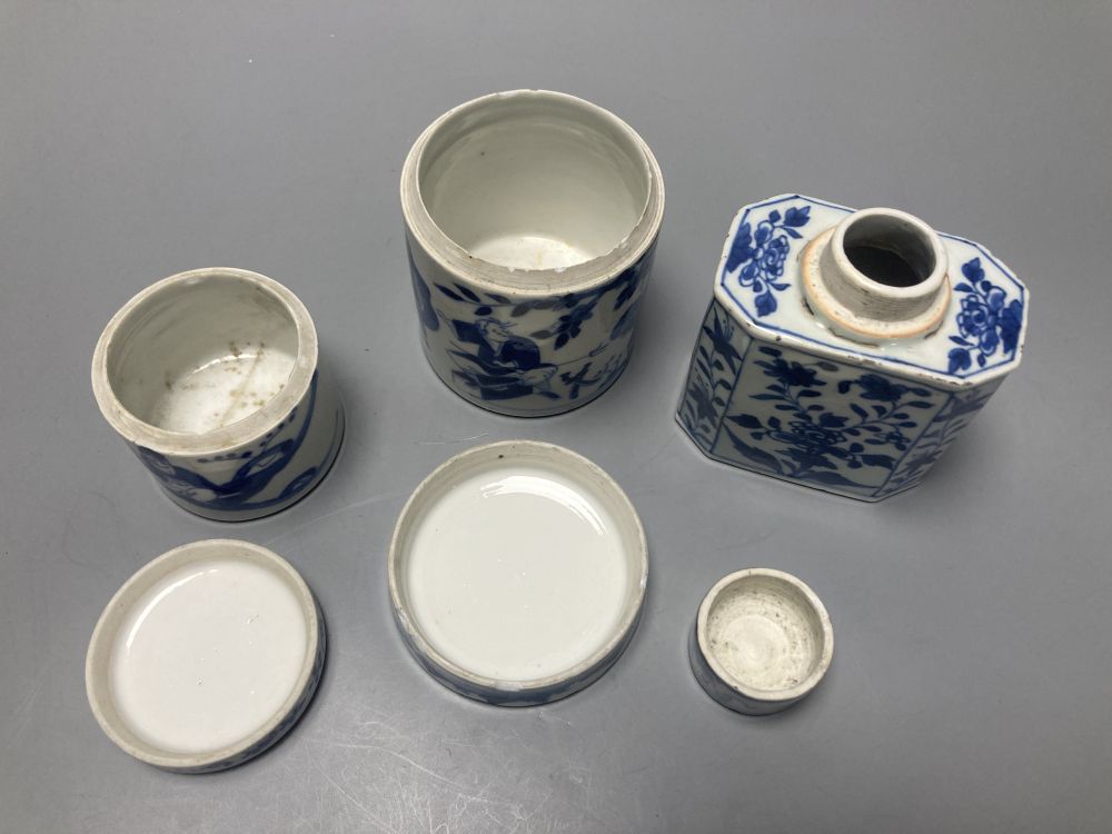 A Chinese blue and white tea canister and cover, Kangxi, 11cm, and two 19th century Chinese blue and white jars and covers
